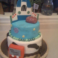 Toy Story Made for a customer whos son was turning three. She did not want any characters on the cake since she was using little minatures she had...