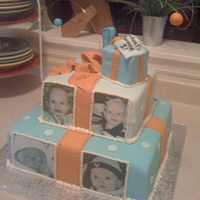 Moments In Time made for a little boy turning one. I was glad to create this since i made the baby shower and baptism cakes. Athe theme was moments in time...