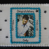 Graduation Cake With Edible Photo 12 x 18" graduation cake with edible photo and gumpaste decorations.