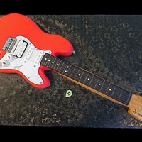 Fender Guitar This was a surprise cake for a groom who loves his guitar. Body is chocolate cake covered in fondant, neck and headstock are RKT covered in...