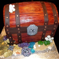 Treasure Chest Treasure cake done for the birthday of a repeat customer (she ordered the Chihuahua cake last year)... I like those :)Cake is 8 layers of...