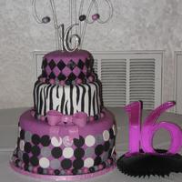 Sweet 16 Bday Cake I made this cake for my niece's sweet 16 party. the bottom tier is a wasc cake filled w/raspberry and white chocolate bc. The middle...