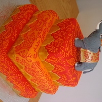 Indian Theme Elephant Cake I made the elephant from fondant. The gold border around each tier is hand painted with a gold glaze. I hand piped all the mehendi details...