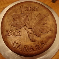 Penny Cake (Canadian) This was a penny cake that I made for a United Way fundraiser event. It was for the completion of a penny collection promotion. Covered in...