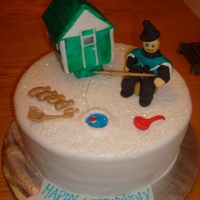 Ice Fishing I copied the ice hut and snowsuit from pictures. I sprinkled large sugar crystals over the fondant to give it a snow effect.