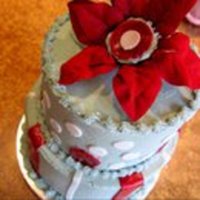 Osu Theme Birthday Cake Last minute for a friend of mine's friend. Silk flower with "enhanced/edible center". Buttercream with fondant accents.