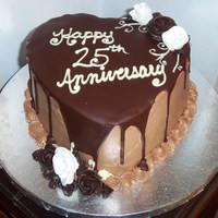 25Th Anniversary Cake Choco cake, choco IMBC, butter ganache, gumpaste flowers and choco frosting flowers.