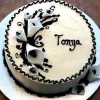 Black/white Birthday Calla lillies made with black glitter, buttercream icing.