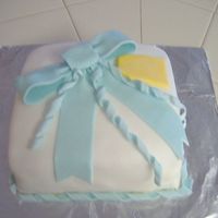 Wilton Course 3 Present Cake Just a simple present, but nice. Vanilla Cake w/ Cookies & Cream Filling