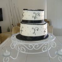 Black & White This was made for a 30th birthday. They wanted a "swank" cake. It was a white cake with raspberry & cream cheese filling with...