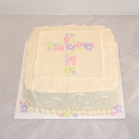 Easter Baptism Cake for a baptism that took place on Easter. Finished in SMBC with fondant flower decoration.