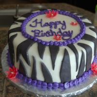 Zebra Birthday Birthday cake requested by a client. She wanted zebra, purple and pink and this is what I came up with. I am not pleased with my piping on...
