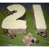 Pacific Tapa 21St Cake Made with love for a Friend, 21st Birthday, Banana Cake with lemon cream cheese icing, Pacific tapa around side and just pip tipped top...