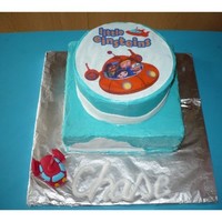 Little Einstine's Cake Little Einstine's cake made for my nephew's 1st birthday, one layer Chocolate cake one layer banana, two different flavor icings...