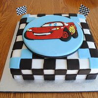 Lightning Mcqueen My grandson's 3rd b-day cake. Lightning McQueen - first time making a colour flow plaque.