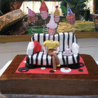 Sofa Birthday Cake Sofa is made from Rice Krispie treats covered in fondant with fondant pillow, rug and miniature birthday cake. Pictures were photo shopped...