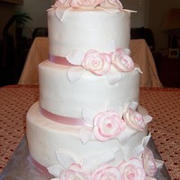 25Th Wedding Anniversary Cake This cake was for a 25th wedding anniversary. Bottom tier is Vanilla with butterpecan filling. middle tier is chocolate with chocolate...