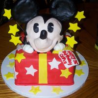 Mickey Mouse For You was asked to re-create a picture the client found on the internet. made a couple of variations. Mickey is rct covered with mmf and cake is...