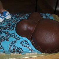 Paisley Belly Cake Paisley pattern matching party napkins. My first gum paste shoes, and belly. This is my favorite cake my cakes so far!