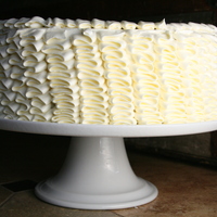 Ruffle Cake Ruffle cake made with a medium petal tip. Swiss meringue buttercream