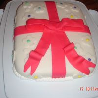 Wilton Course 3 Bow and cake made of fondant.