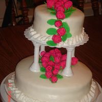 Wilton Course3 The final cake for Wilton Course 3. I was having trouble making the fondant roses, they turned out like rosebuds.