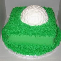 Square Golf Ball Cake 3- 1 inch layered 8 inch square cake coveredw/MMF and BC grassgolf ball is covered w/MMF