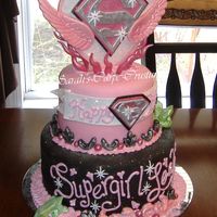 Supergirl!!! This was for my Daughters 6th B-day. I went overboard but she loved it! SO much fun. The topper is gumpaste and hardened fondant....