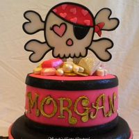 Pink Pirate Morgan The topper is made from all gumpaste and luster dusts and disco dusts on popsicle sticks. That outlining was a real pain! The jewels and...