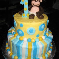 First Birthday Cake Banana cake with buttercream and fondant decorations