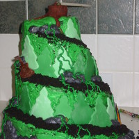 Hiking Trail Cake First time to carve a cake. As you can see we had quite a few difficulties with it leaning so we ended up having the skewer in the cake...