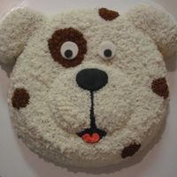 Spot The Dog Wilton Animal Cracker Pan, B/C icing with size 16 + 18 stars, fondant eyes and mouth, with bead tongue.