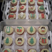 Christmas Cupcakes These were for my moms office Christmas party. Red velvet cupcakes with candies made with molds and candy melts.