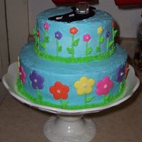 Summer Drive! I made this cake a double birthday, one girl and one boy. The girl liked flowers and the boy just turned 16, and got his license! Thanks...