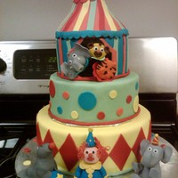 Circus Themed Cake All gumpaste figurines. Big top is made of RCT. Thanks for looking. I'm super proud of this cake. It took so long, but so worth it.
