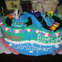 Race Car Birthday! one cake is vanilla with a layer or whipped cream and raspberry filling and one cake is chocolate with whipped cream and raspberry filling...