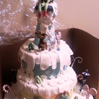 Grinch CAKE WAS MOUNT CRUMPIT WITH GRINCH AND CINDY WHO. SOME GUMPASTE AND PASTILLAGE AND FONDANT WORK.