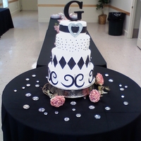 Bling Wedding THE CAKE WAS COVERED IN FONDANT, WITH HAND MADE ACCENTS