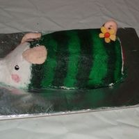 Poogie Poogie/piggy in a watermelon suit from Monster Hunter.