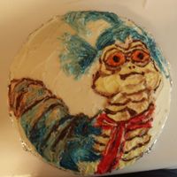 Labyrinth Blue Worm Alright, my third cake ever is the blue worm from the movie Labyrinth. I drew the worm on with toothpicks.