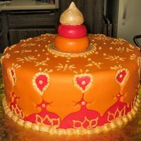 Indian Theme This cake was for an Indian themed bridal shower. There was no plan for the cakes look, my instructions were indian theme, orange, red, and...