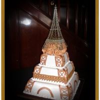Eiffel Tower This was my first wedding cake. It was a stacked 16", 12", 8", chocolate chambord cake, with rasperry chambored puree...