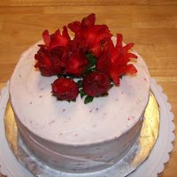 Strawberry Bouquet Strawberry cake with strawberry cream cheese icing and my first attempt at carved strawberries to look like a rose bouquet.