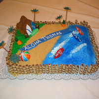 Luau Themed Bday Party All buttercream icing with fondant accent pieces all hand made and painted with luster pearl dust.