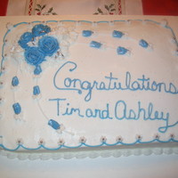 Winter Ice Blue Wedding Shower White/Chocolate marble cake with all buttercream and dusted with silver luster dust to shimmer the roses.