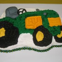 John Deere Tractor I did this for my Dad who is a John Deere owner. Made with a Chocolate cake, bc icing.