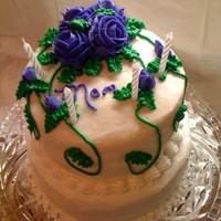 Purple Rose Cake Two tiered cake with purple roses. Almond cake with all buttercream