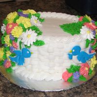 Course 2 Finale Typical finale cake. BC basketweave, royal flowers and color flow birds. Was a lot of fun to do.