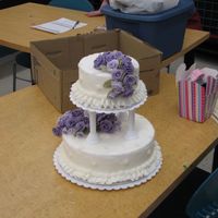 Finale Cake For Couorse 3, First Teired Cake Was pleasantly surprised at how well this went together. BC covered with fondant roses and small dasiy cut outs.