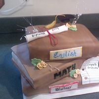 Graduation Stacked Book Cake I thought this cake was beyond me, but I did it. I found this cake on CC - and I wish that I remembered the name of the person to give them...